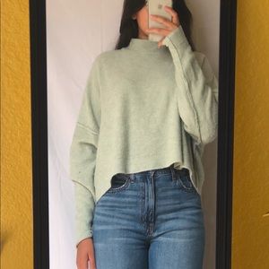 Green Cotton on sweater